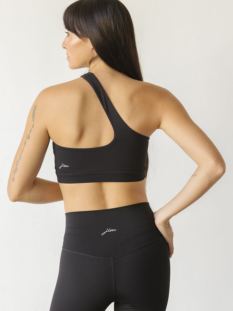 Asymetryczny czarny stanik do jogi Vibe Out - widok z tyłu