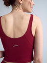 Damski bordowy crop top do ćwiczeń i jogi Grace - widok na plecy i logo JOYINME