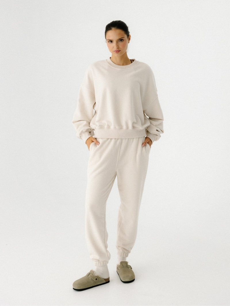 Kremowe, luźne bawełniane spodnie dresowe damskie KIND - set z kremową bluzą oversize