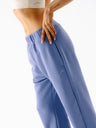 Niebieskie bawełniane spodnie dresowe damskie Evolve - widok na ściągacz w pasie