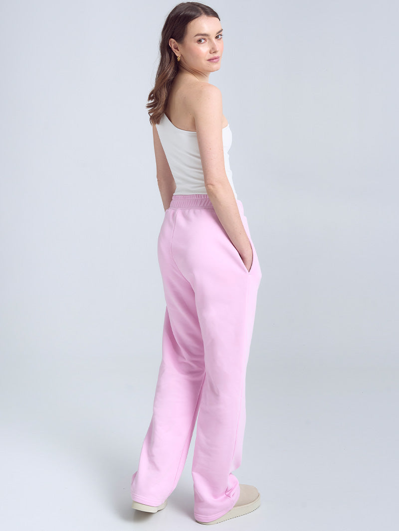 Różowe bawełniane spodnie dresowe Evolve - widok na ściągacz w pasie