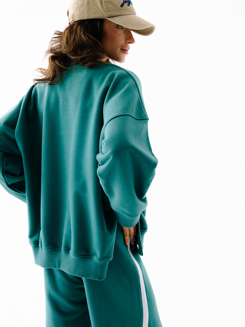 Zielona, luźna bawełniana bluza oversize Kind - widok z tyłu